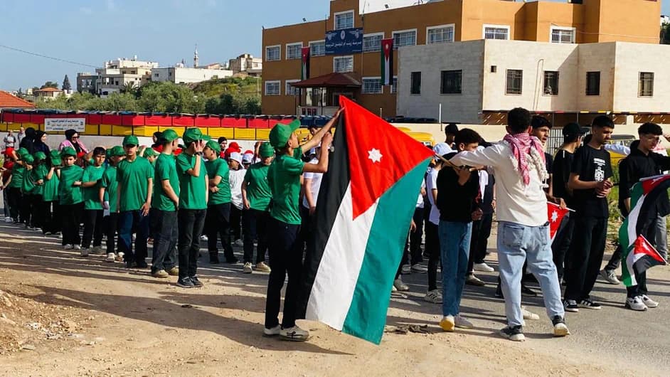 Lulu’at AlElm students during the Flag Day parade