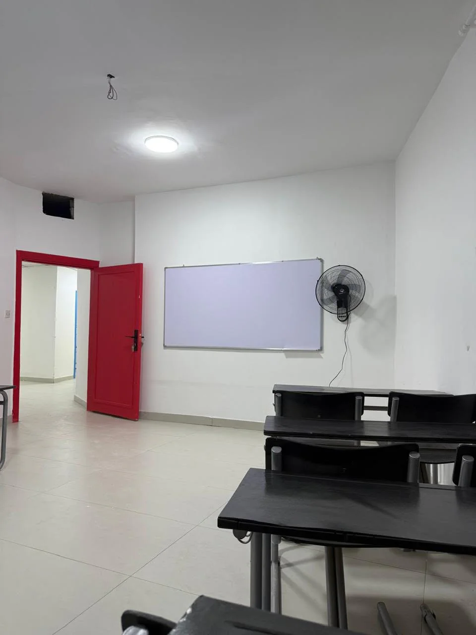 Classroom whiteboard at Lulu'at AlElm Schools