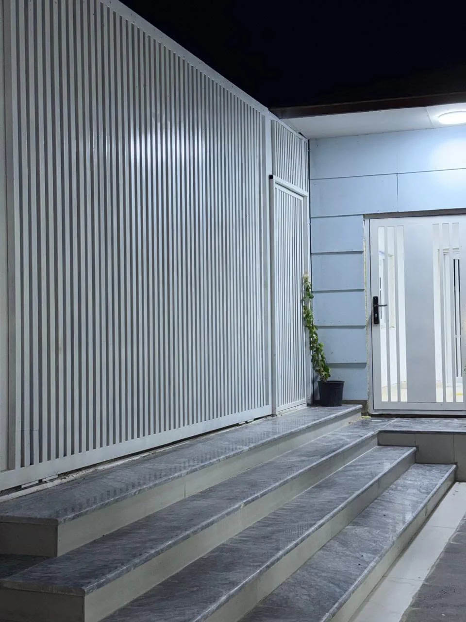 Lulu'at AlElm Schools entrance at night